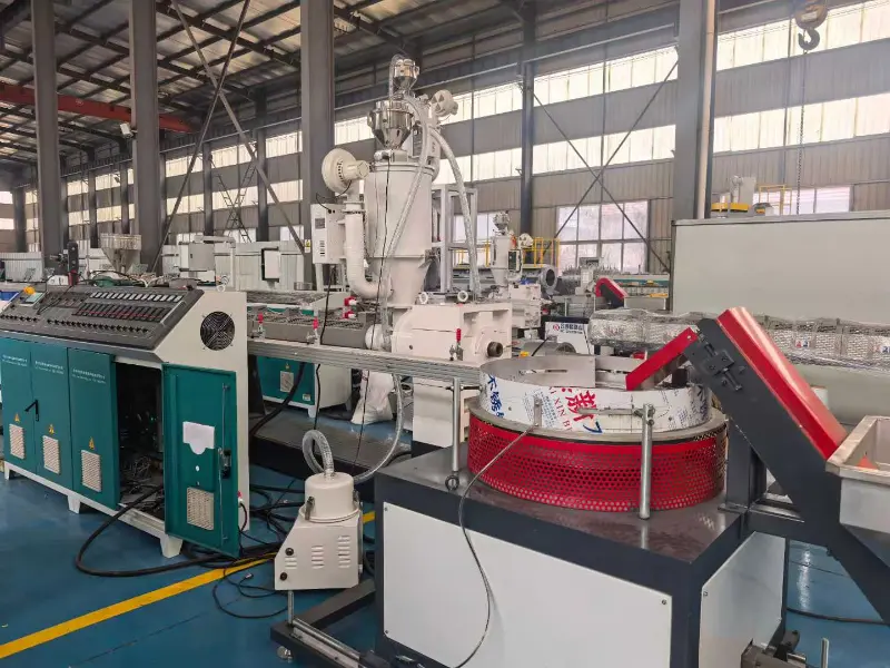 The Cylindrical Drip Irrigation Pipe Machine is Currently Being Installed and Preparing for Testing The Cylindrical Drip Irrigation Pipe Machine is Currently Being Installed and Preparing for Testing